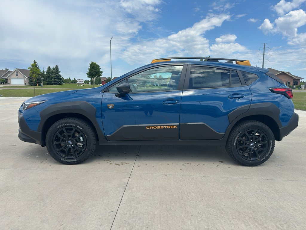 2026 Subaru CROSSTREK Wilderness in Geyser Blue — front three-quarter view