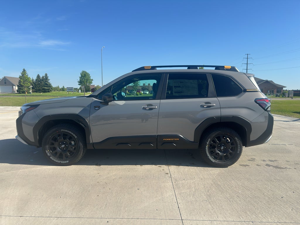 2026 Subaru FORESTER Wilderness in River Rock Pearl — front three-quarter view