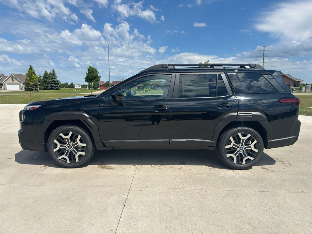 2026 Subaru OUTBACK Touring XT in Crystal Black Silica — front three-quarter view
