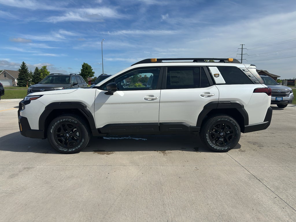 2026 Subaru OUTBACK Wilderness in Crystal White Pearl — front three-quarter view