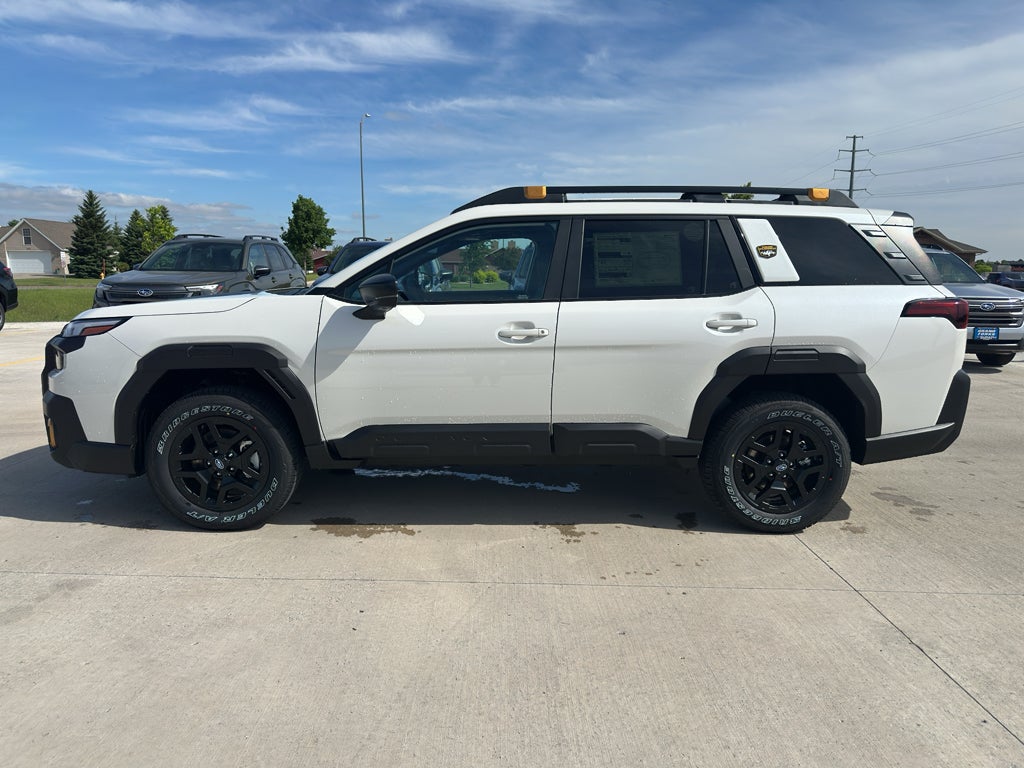 2026 Subaru OUTBACK Wilderness in Crystal White Pearl — front three-quarter view