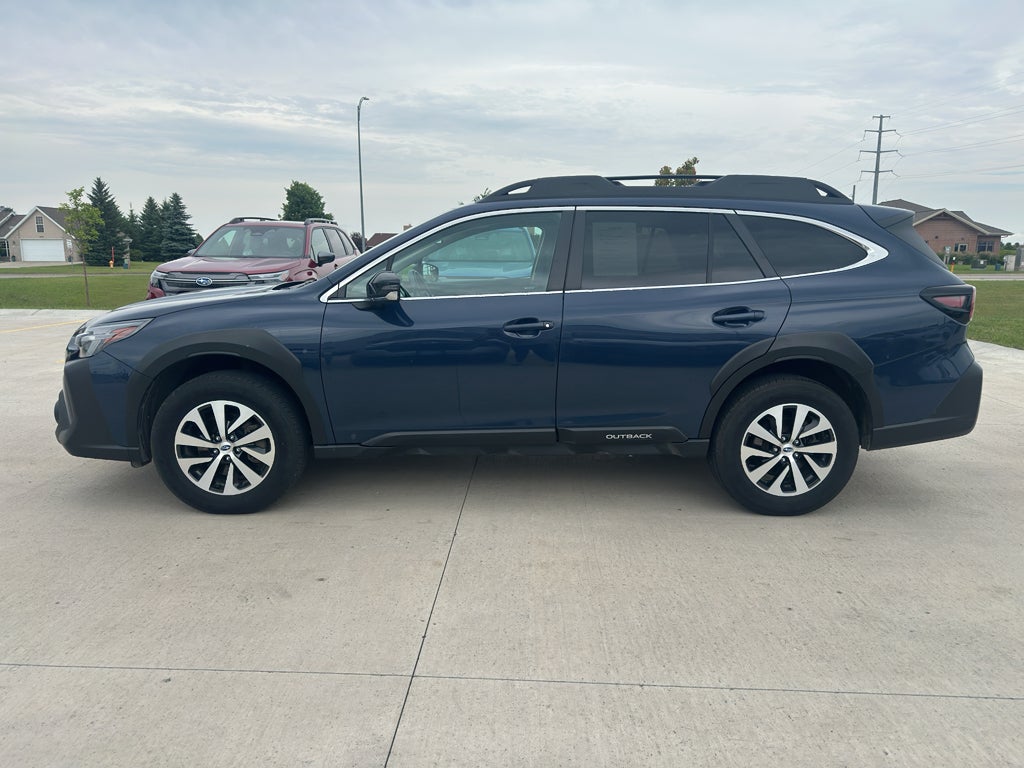 2024 Subaru Outback Premium in Cosmic Blue Pearl — front three-quarter view