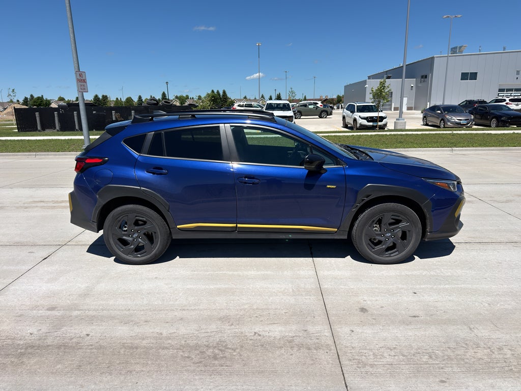 2024 Subaru Crosstrek Sport in Sapphire Blue Pearl — front three-quarter view