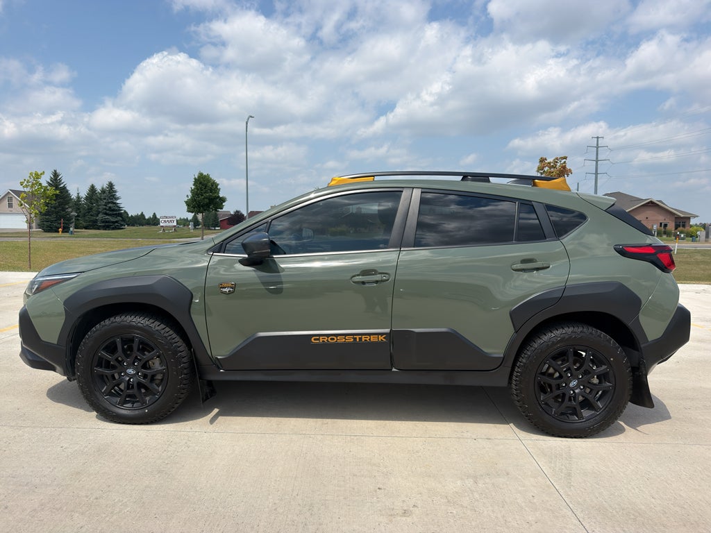 2024 Subaru Crosstrek Wilderness in Alpine Green — front three-quarter view