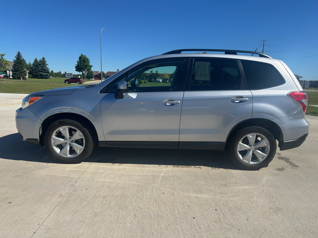 2015 Subaru Forester 2.5i Premium in Ice Silver Metallic — front three-quarter view