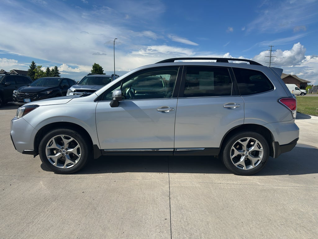 2018 Subaru Forester Touring in Ice Silver Metallic — front three-quarter view